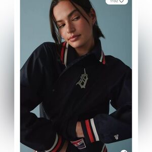 Genuine Merchandise Varsity Jacket in Navy with Red and White Trim
